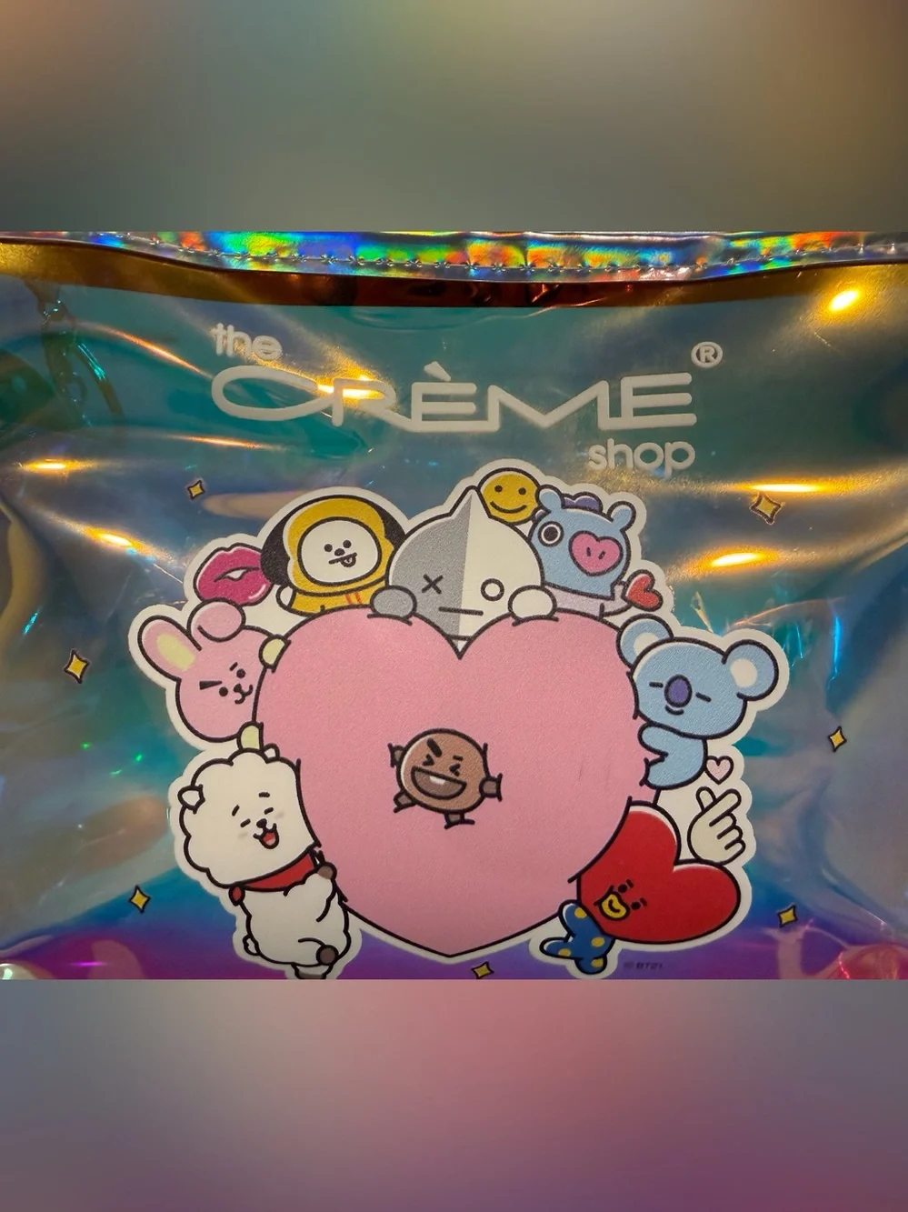 Crème Shop holographic BT21 pouch with purple fuzzy star charm NWT